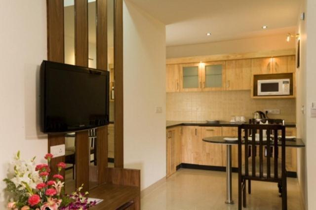 The Nines Business Hotel Bengaluru Szoba fotó
